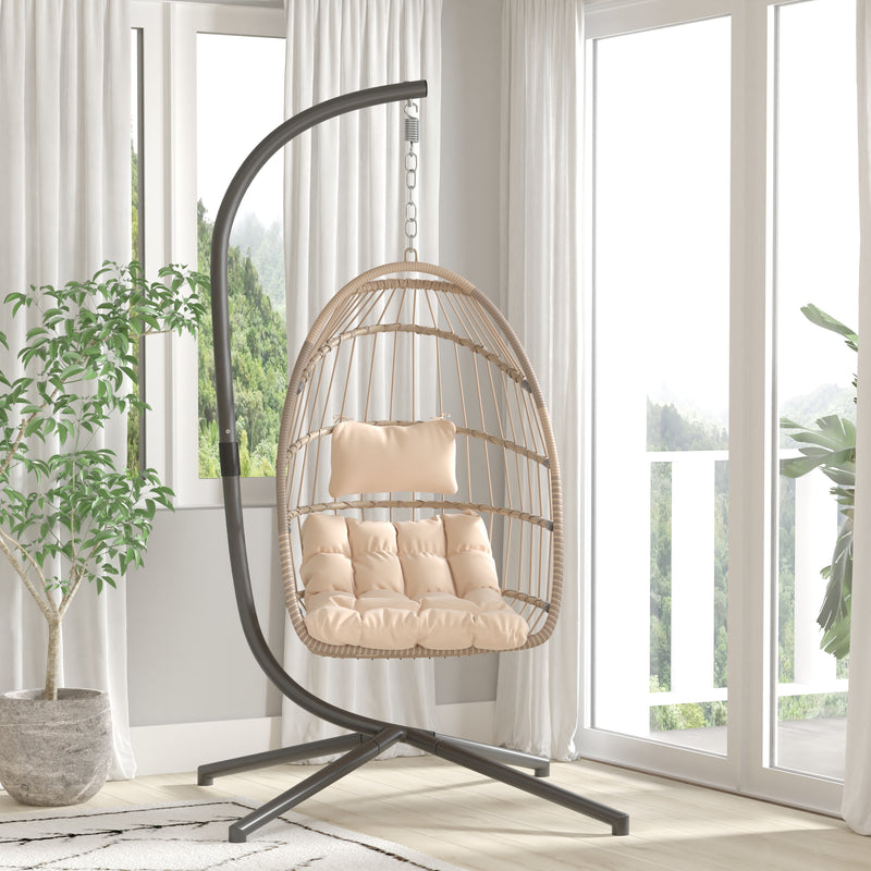 Riley Foldable Woven Hanging Egg Chair in Natural with Removable Cream Cushions and Stand for Indoor and Outdoor Use