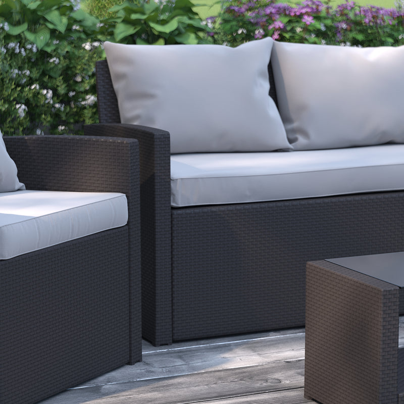 Atlas 4 Piece Patio Set Contemporary Black Loveseat, 2 Chair and Coffee Table Set with Gray Back Pillows and Seat Cushions